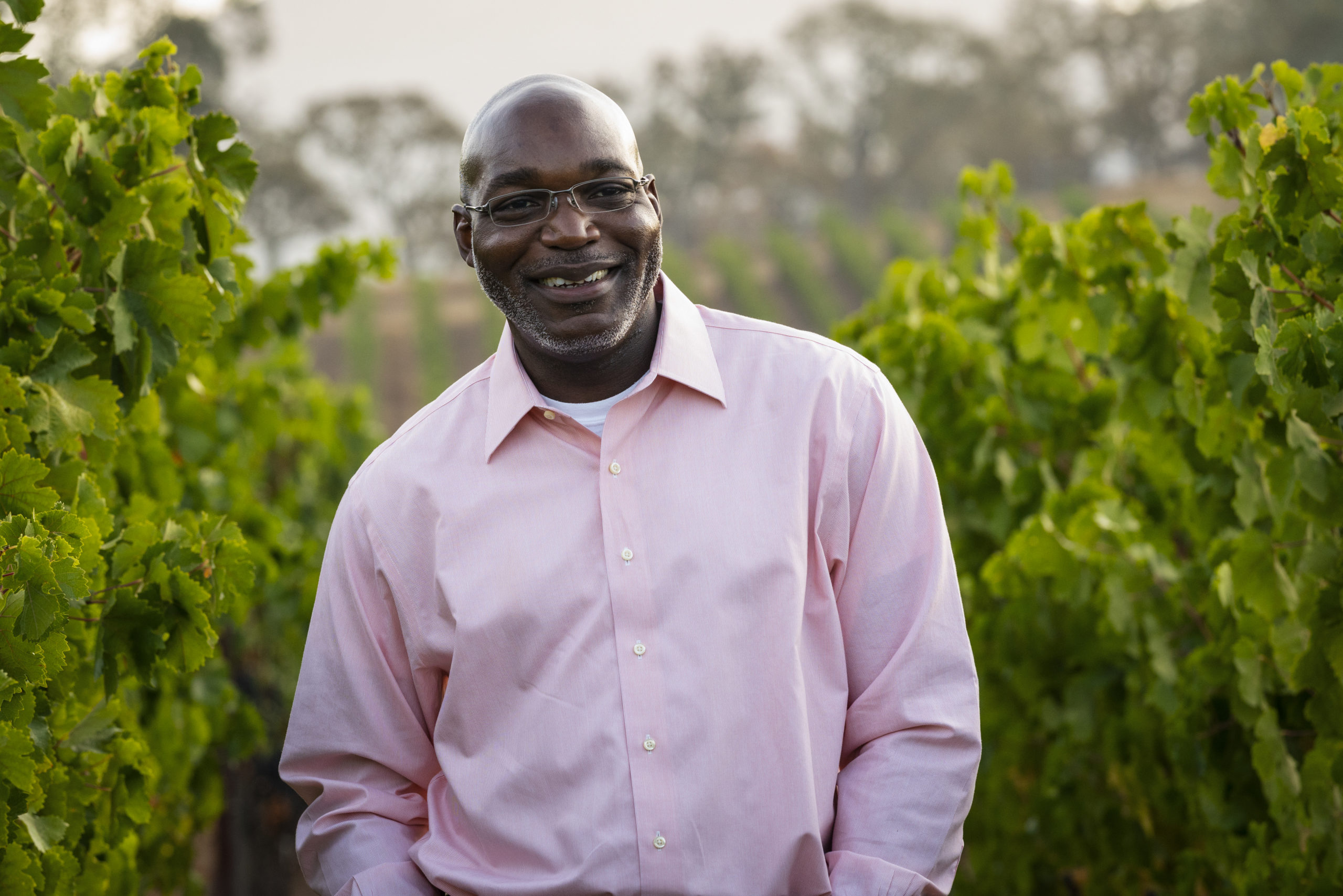 Marbue Marke standing in vineyard