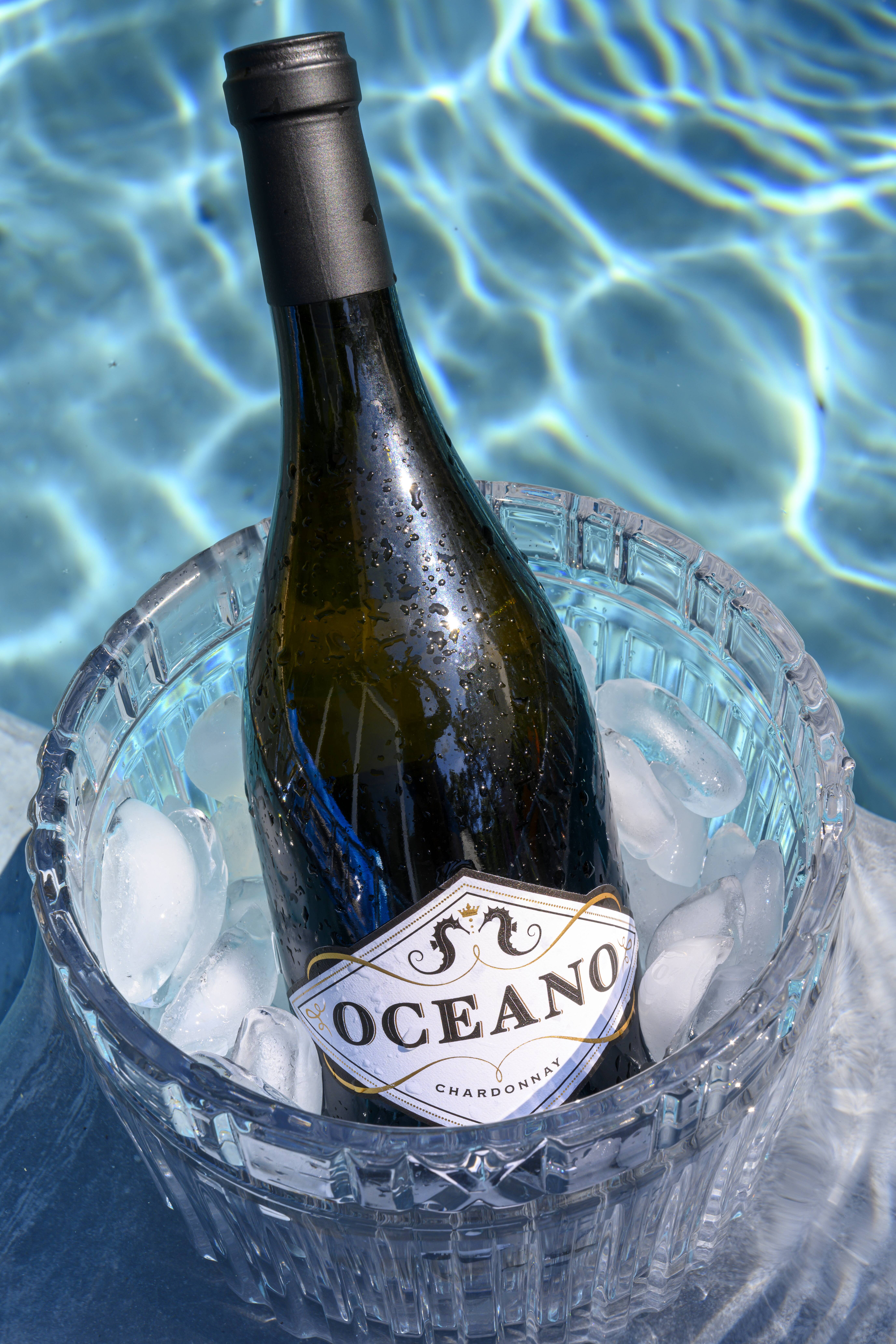 Oceano wine bottle chilling in ice bucket in the pool
