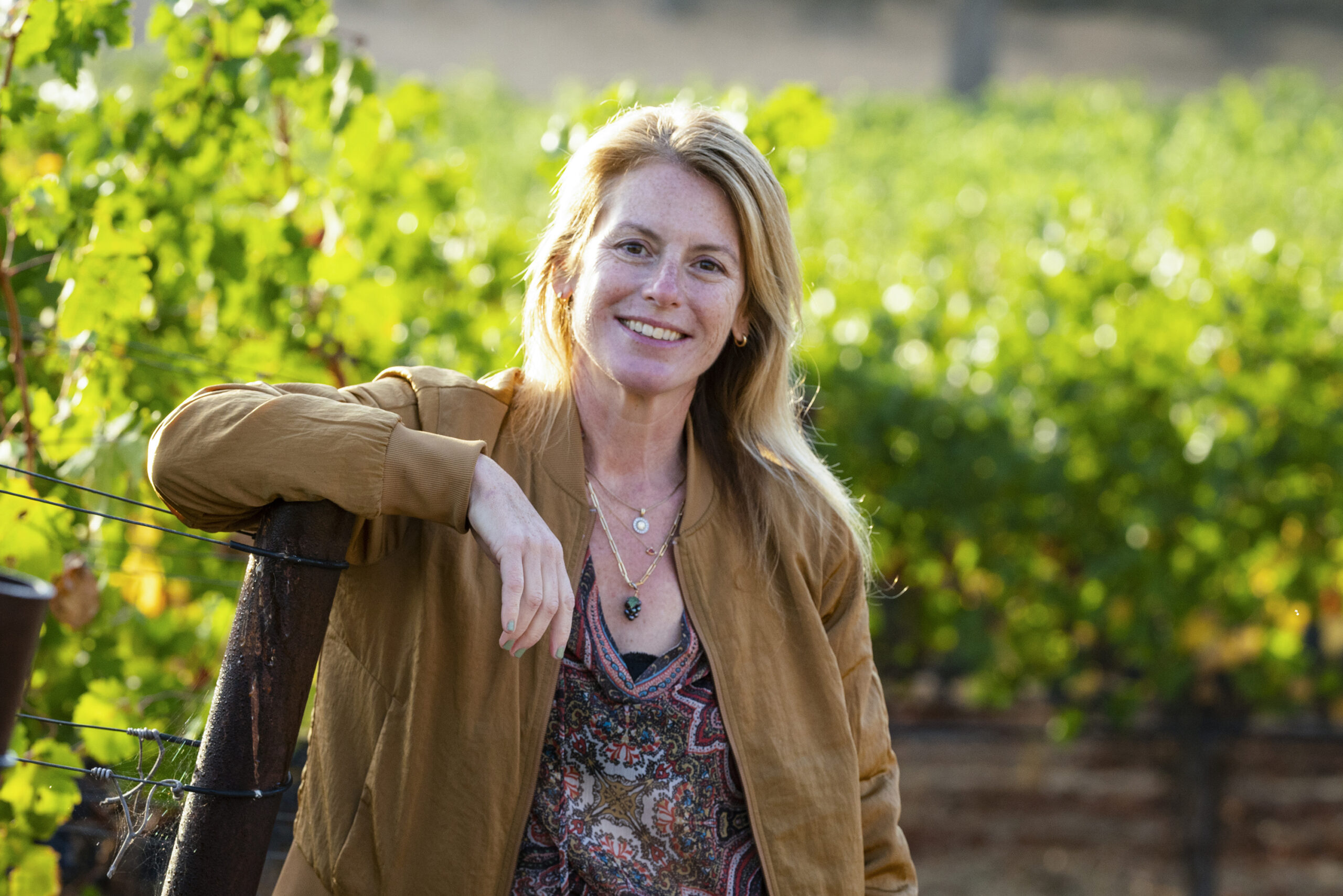Rachel Martin, Founder of Oceano Wines, hanging out in sunny Vineyard