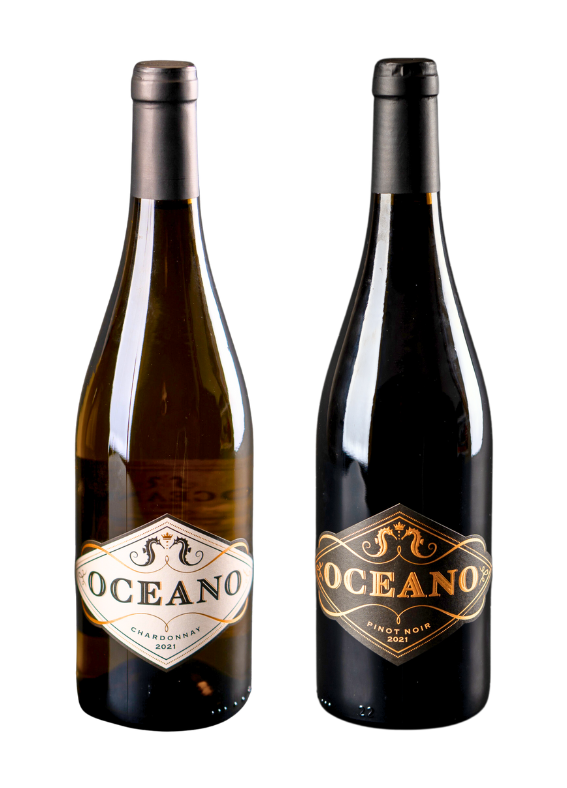 Image of two bottles of 2021 wine standing side by side - a bottle of chardonnay wine and a bottle of pinot noir wine.